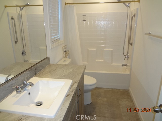 16355 Dam Road Clearlake, CA 95422 - Photo 12 of 21 a bathroom with a sink a toilet and shower