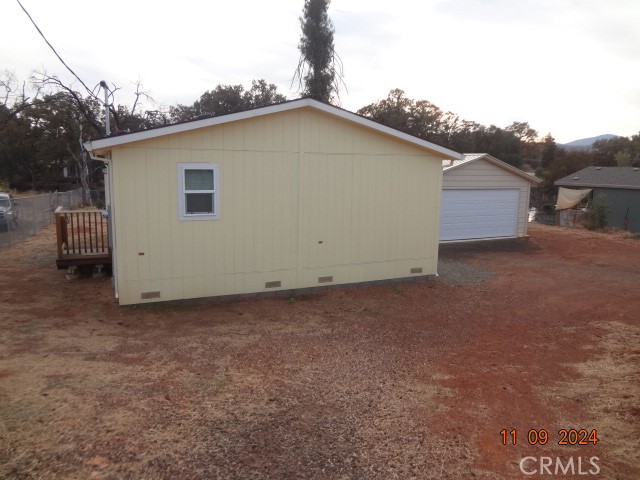 16355 Dam Road Clearlake, CA 95422 - Photo 19 of 21 a house view with a backyard space