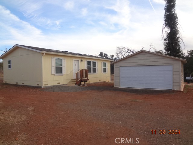 16355 Dam Road Clearlake, CA 95422 - Photo 20 of 21 a view of a house with a backyard