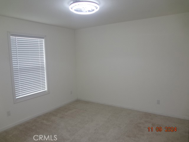 16355 Dam Road Clearlake, CA 95422 - Photo 9 of 21 an empty room with a window