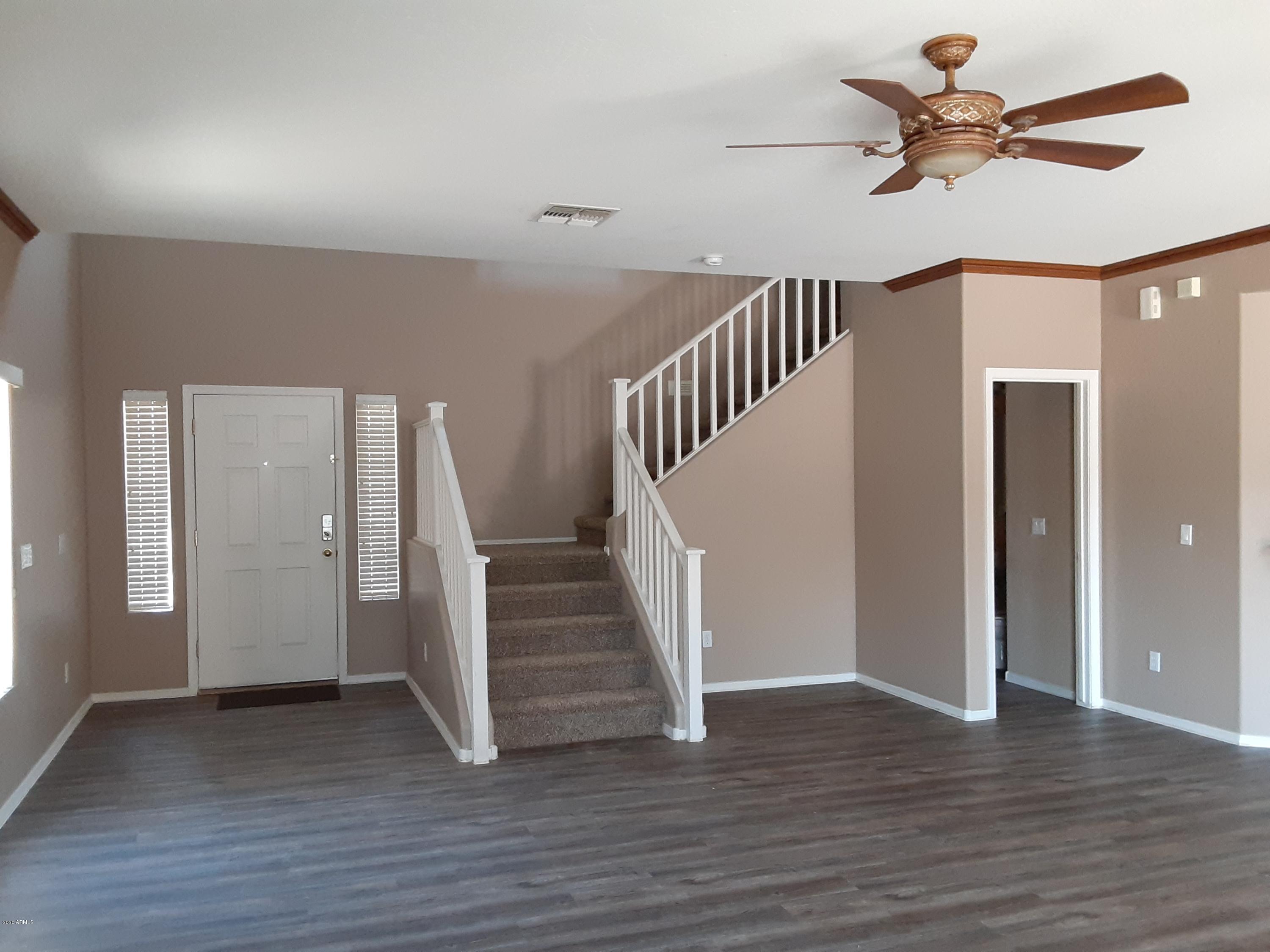 45041 Portabello Road Maricopa, AZ 85139 - Photo 2 of 43 Living room to entry