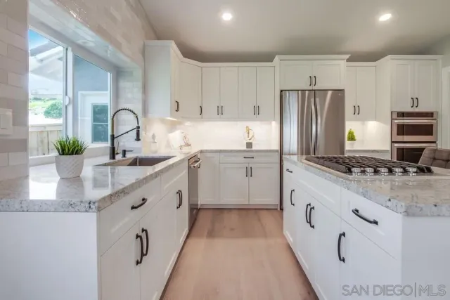 a bed room with a bed and a window