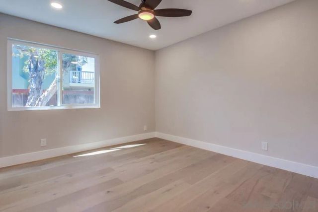 a view of a balcony with chairs
