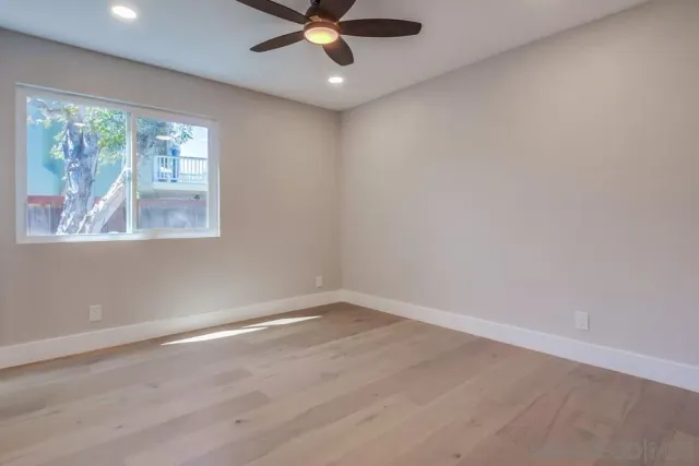a view of a balcony with chairs
