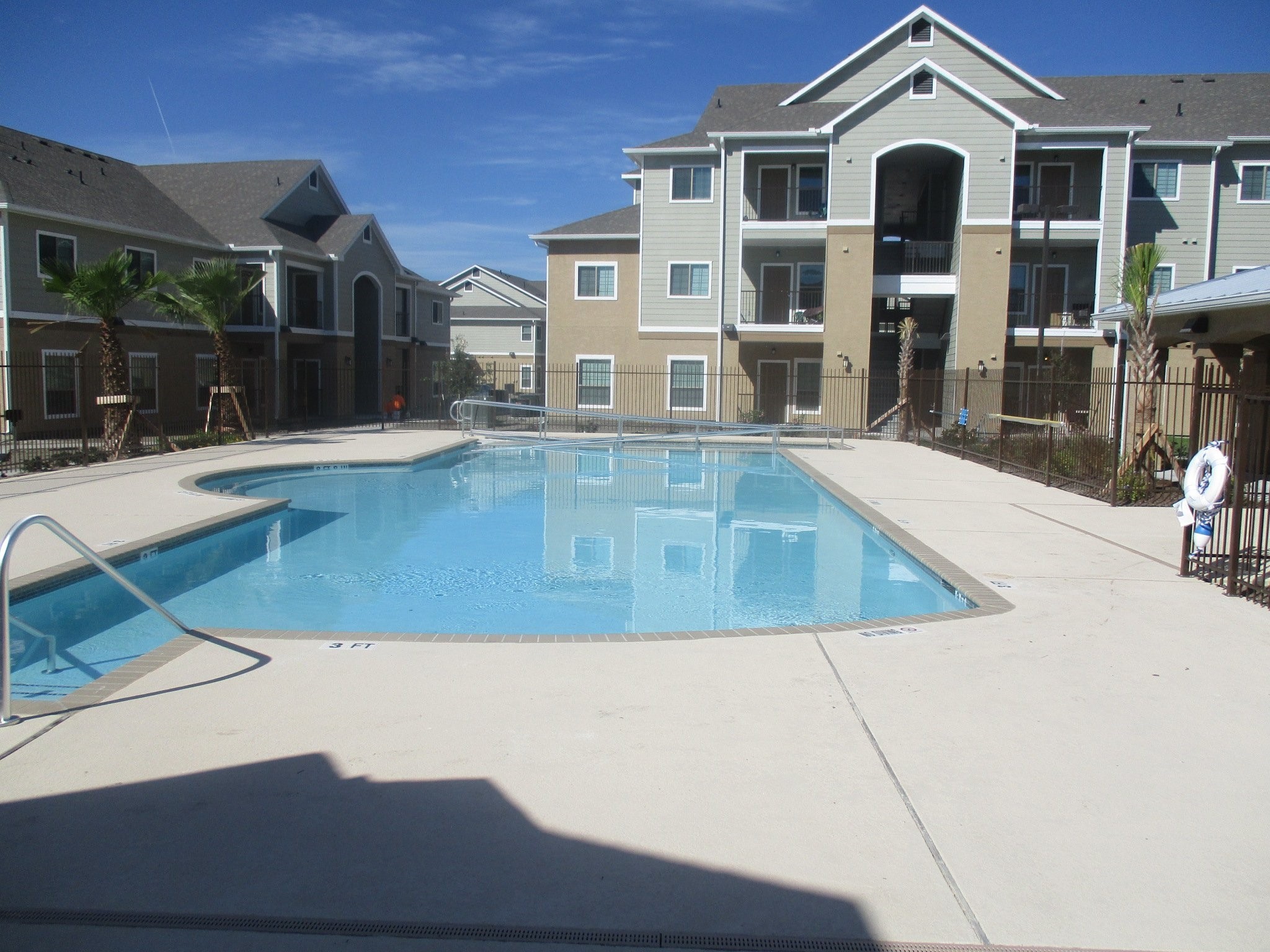 5201 Kostoryz Road Corpus Christi, TX 78415 - Photo 5 of 9 a view of a house with a swimming pool