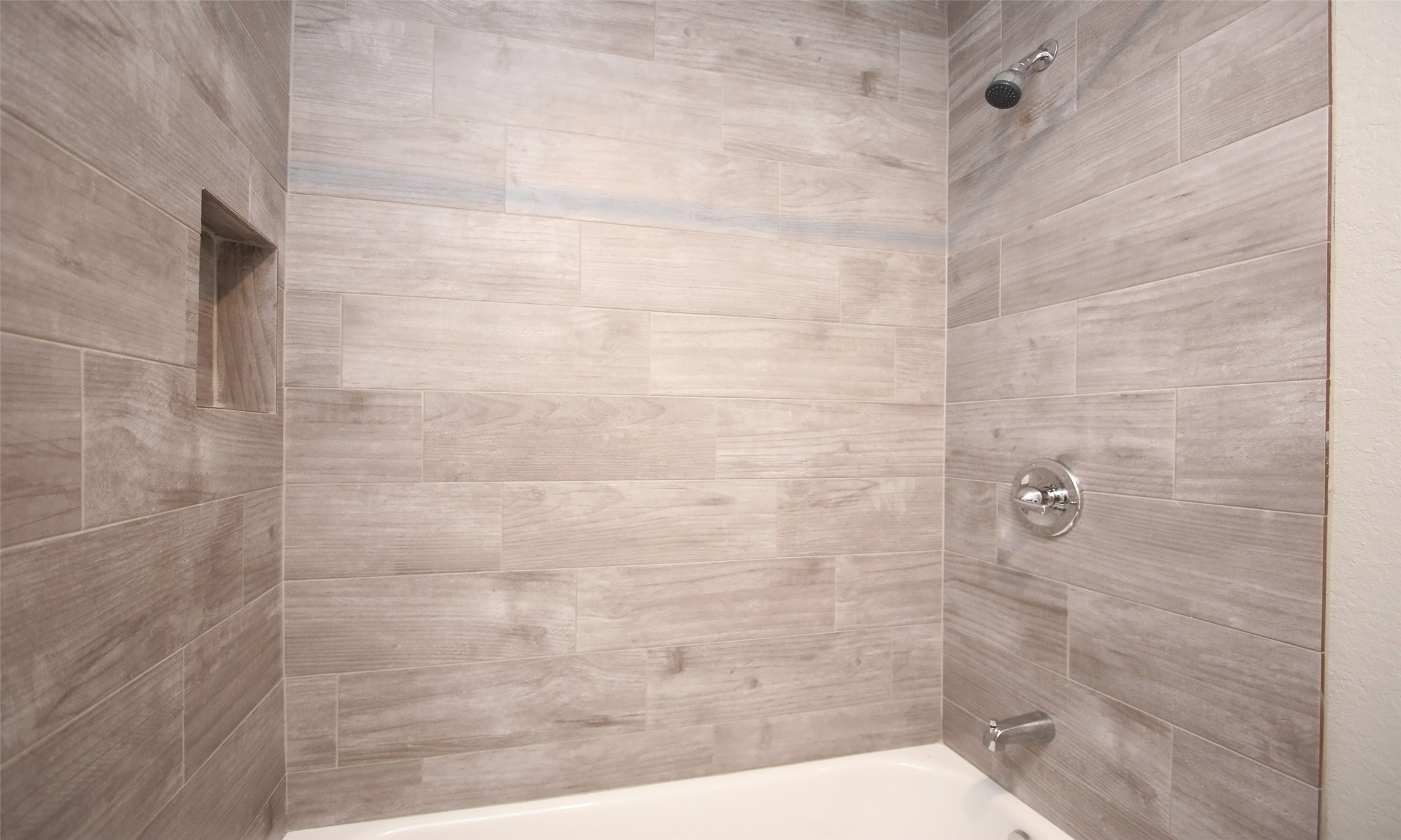 5201 Crawford Street, Unit 5 Houston, TX 77004 - Photo 9 of 10 a bathroom with a shower
