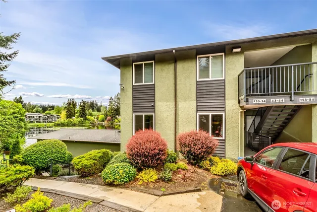 a front view of a house with outdoor space