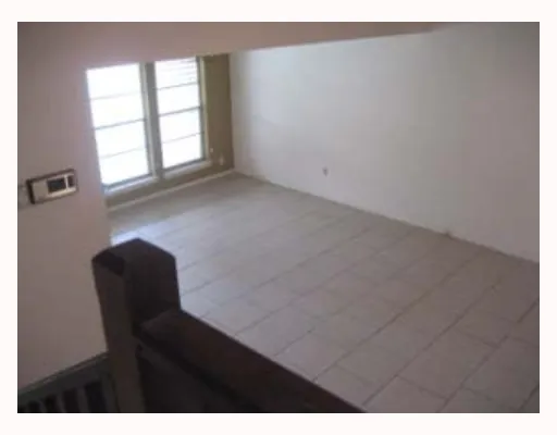 a view of livingroom with furniture and windows