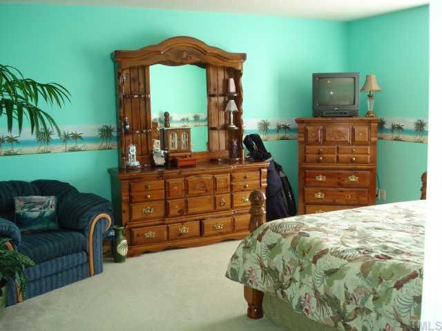 5845 Covered Bridge Road Clayton, NC 27527 - Photo 8 of 11 GRAND Master Bedroom with HIS AND HER WALK-IN closets and a LUXURIOUS and PRIVATE Master Bath RETREAT!