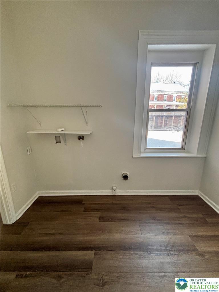350 Main Street, Unit 5 Slatington, PA 18080 - Photo 14 of 18 an empty room with wooden floor and window