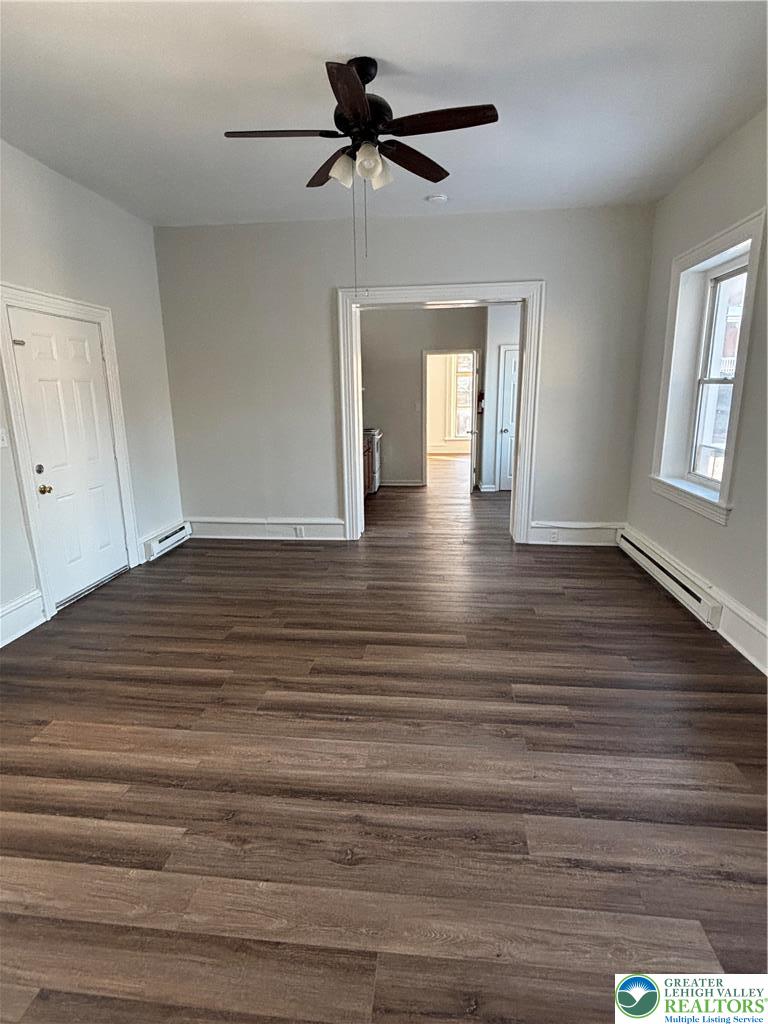 350 Main Street, Unit 5 Slatington, PA 18080 - Photo 5 of 18 a view of empty room with wooden floor and fan
