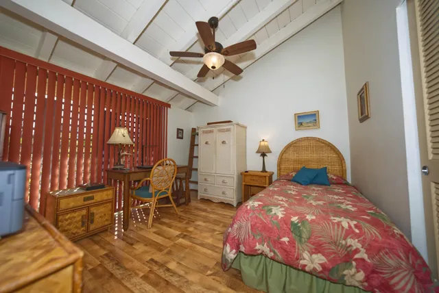 a bathroom with a toilet sink and shower