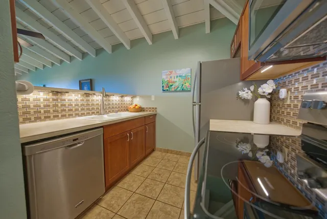 a bathroom with a sink a vanity and mirror