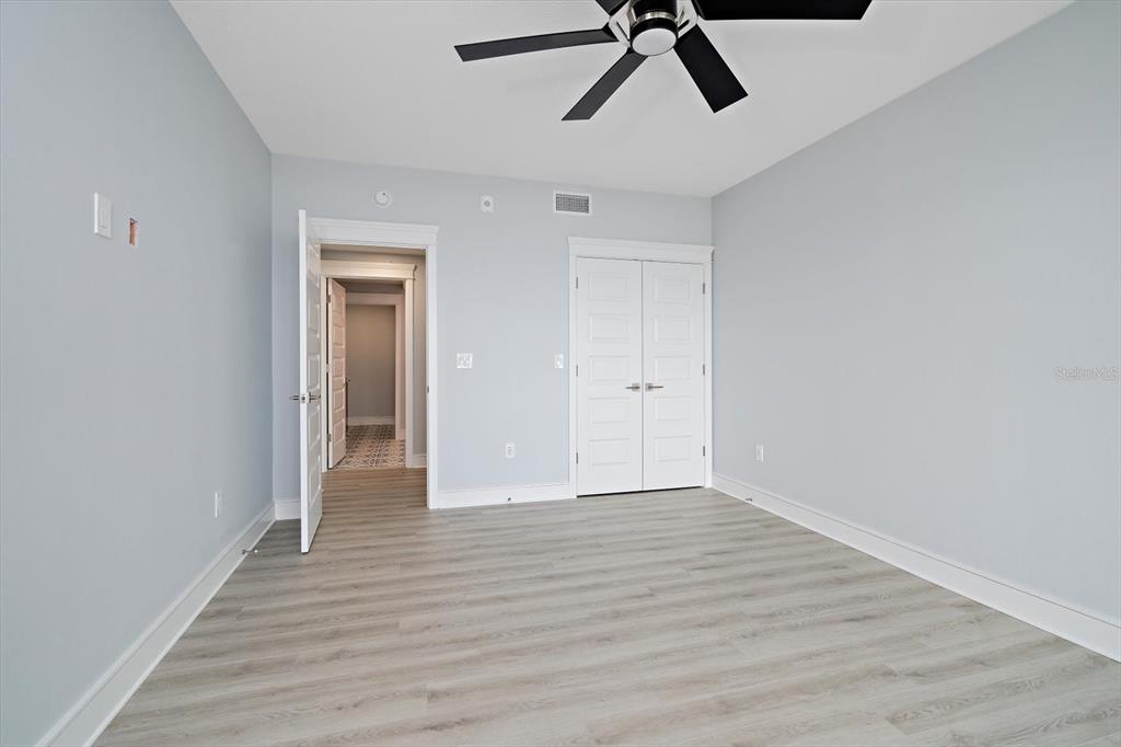 50 Coe Road, Unit 125 Belleair, FL 33756 - Photo 34 of 67 a view of a room with wooden floor and carpet