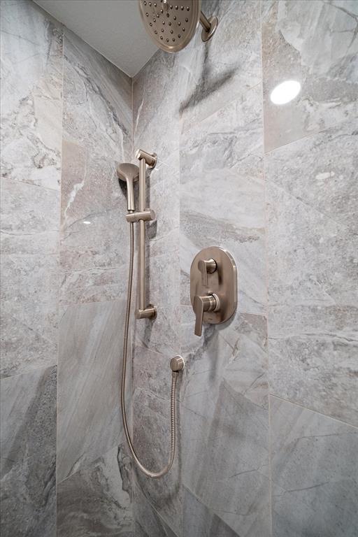 50 Coe Road, Unit 125 Belleair, FL 33756 - Photo 46 of 67 a bathroom with a shower