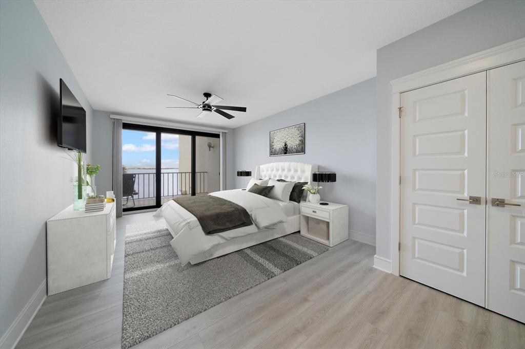 50 Coe Road, Unit 125 Belleair, FL 33756 - Photo 6 of 67 a bedroom with furniture and a large window