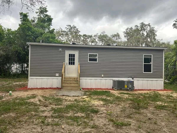 a front view of house with yard