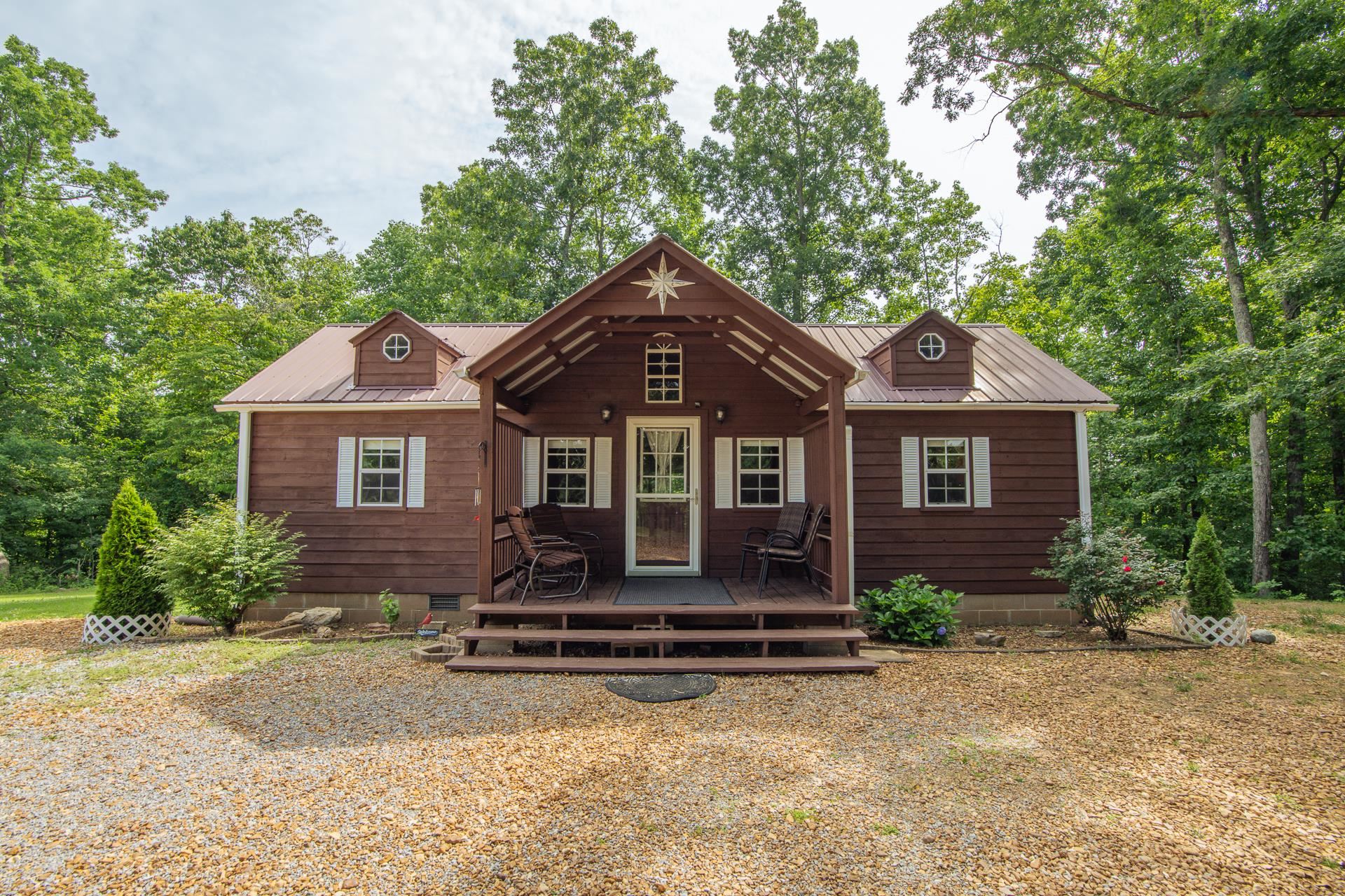23 Old Ferry Road Bath Springs, TN 38311 - Photo 17 of 40 a front view of a house with a yard