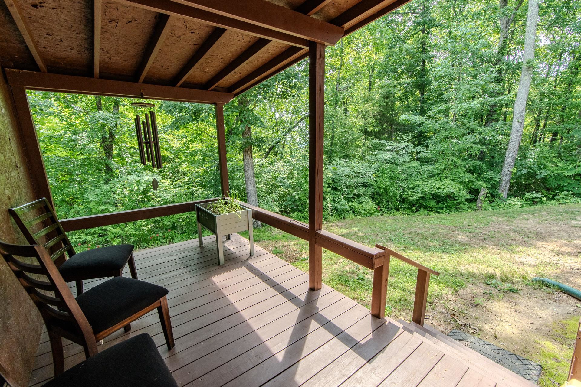 23 Old Ferry Road Bath Springs, TN 38311 - Photo 28 of 40 a view of two chairs in a balcony