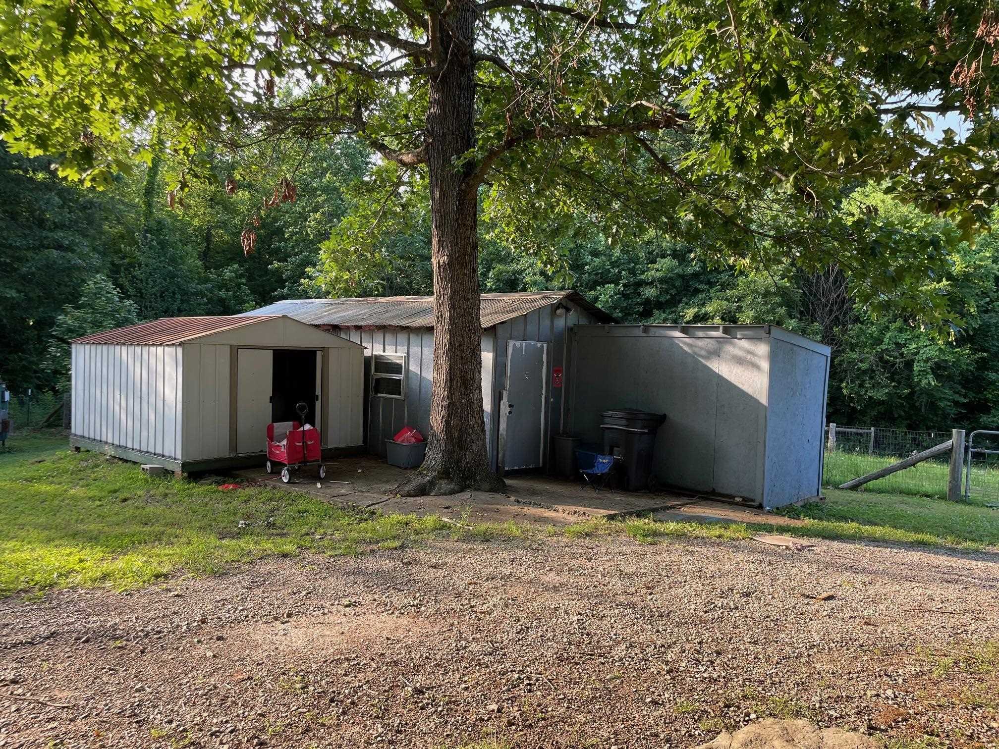23 Old Ferry Road Bath Springs, TN 38311 - Photo 36 of 40 a view of a house with a yard