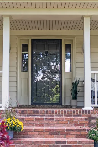 a view of a dining room with a large window