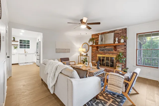 a stove top oven sitting inside of a kitchen