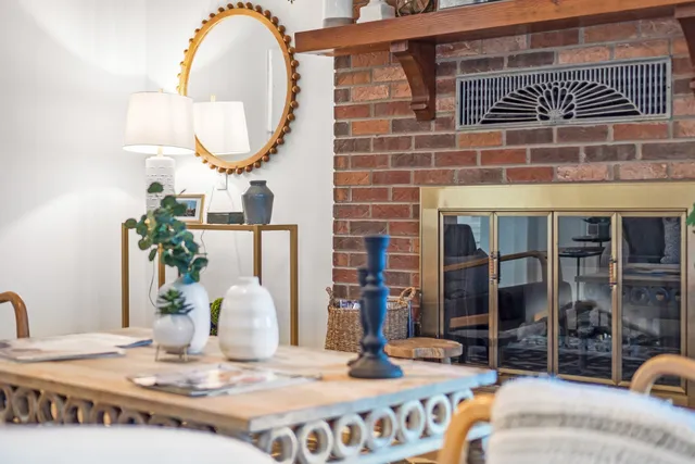 a kitchen with stainless steel appliances granite countertop a stove and cabinets