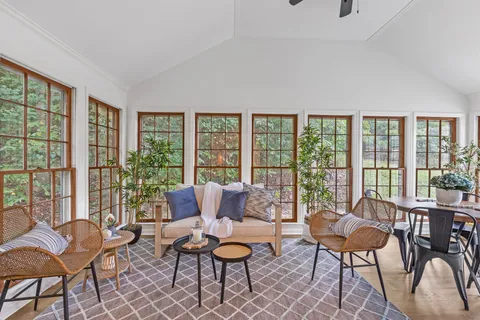 a living room with furniture and a window