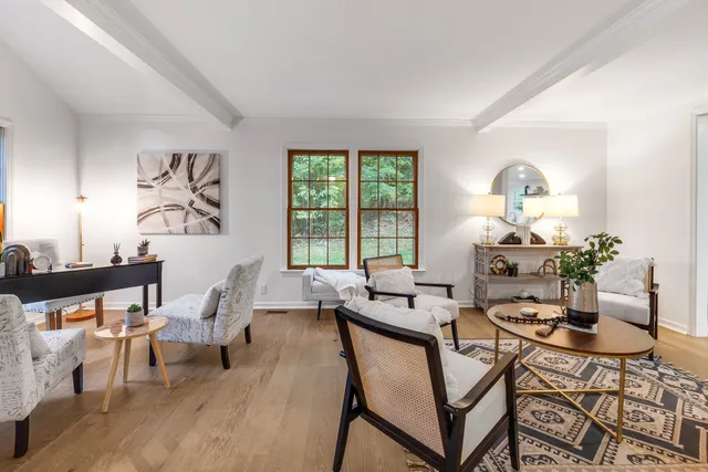 a bedroom with a bed and a couch