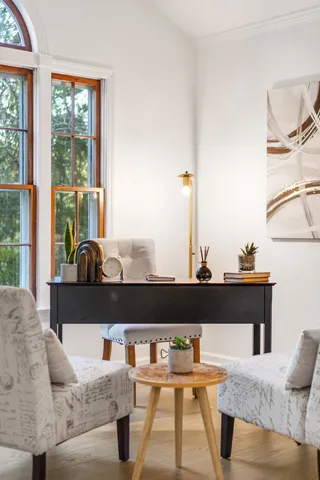 a spacious bathroom with a double vanity sink a mirror and a shower