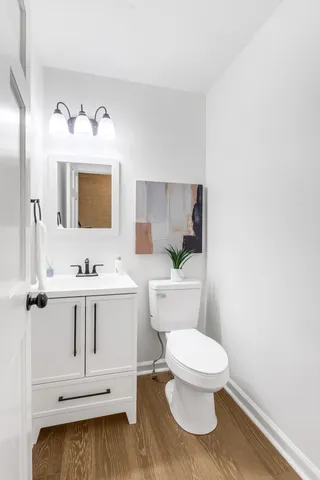 a view of a room with shelf on the wall