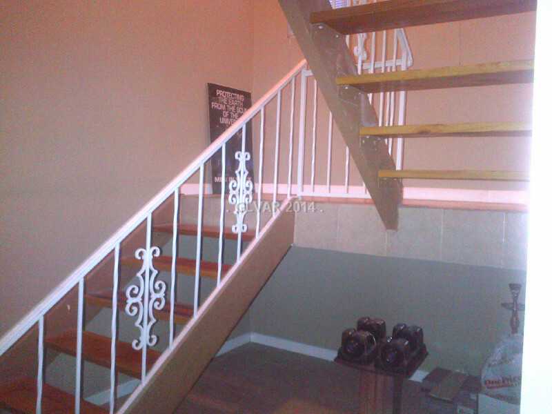 2234 East Desert Inn Road, Unit 2234 Las Vegas, NV 89169 - Photo 4 of 12 Property Photo. Open Stairway to Spacious Master bedroom, Guest bedroom, vanity make up area and Full Bath.
