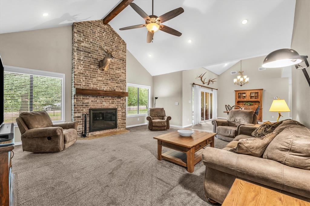 613 Bone Road Valley Mills, TX 76689 - Photo 3 of 40 a living room with furniture and a fireplace