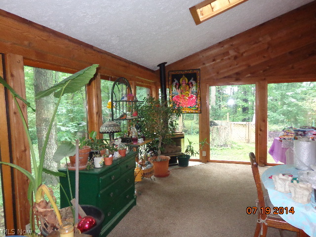 43122 Webster Road Wellington, OH 44090 - Photo 11 of 23 If you like sun & awesome views you will love this room, great for entertaining