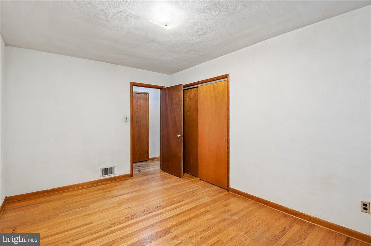 1509 Duvall Road Annapolis, MD 21409 - Photo 32 of 39 a view of empty room with wooden floor