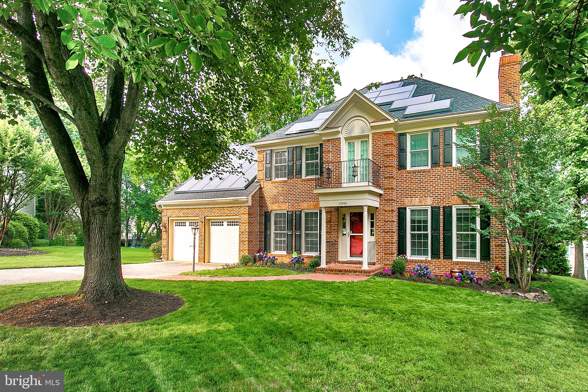 13500 Over Ridge Court Chantilly, VA 20151 - Photo 1 of 41 a front view of a house with a yard