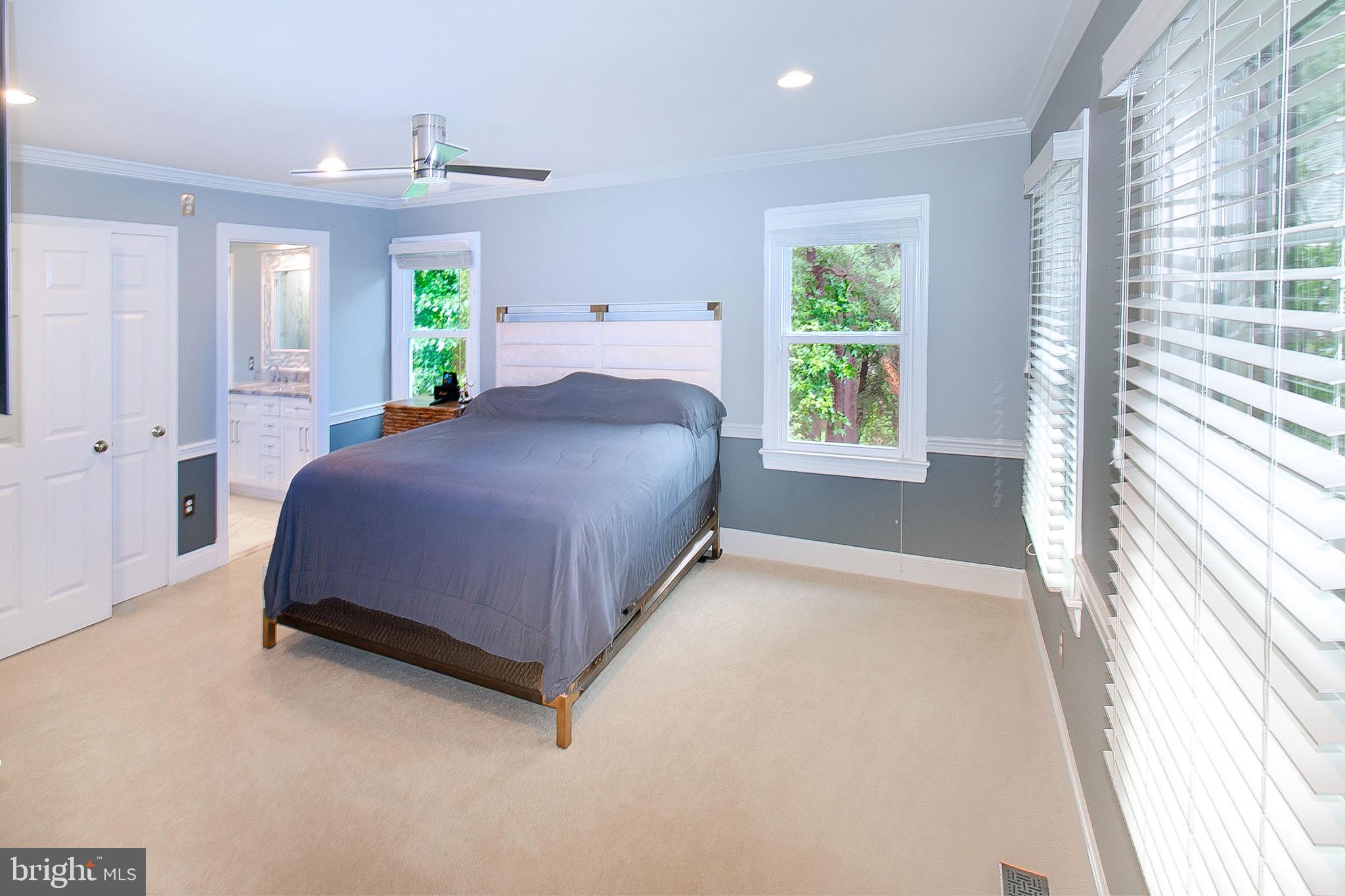 13500 Over Ridge Court Chantilly, VA 20151 - Photo 20 of 41 a bedroom with a bed window and mirror