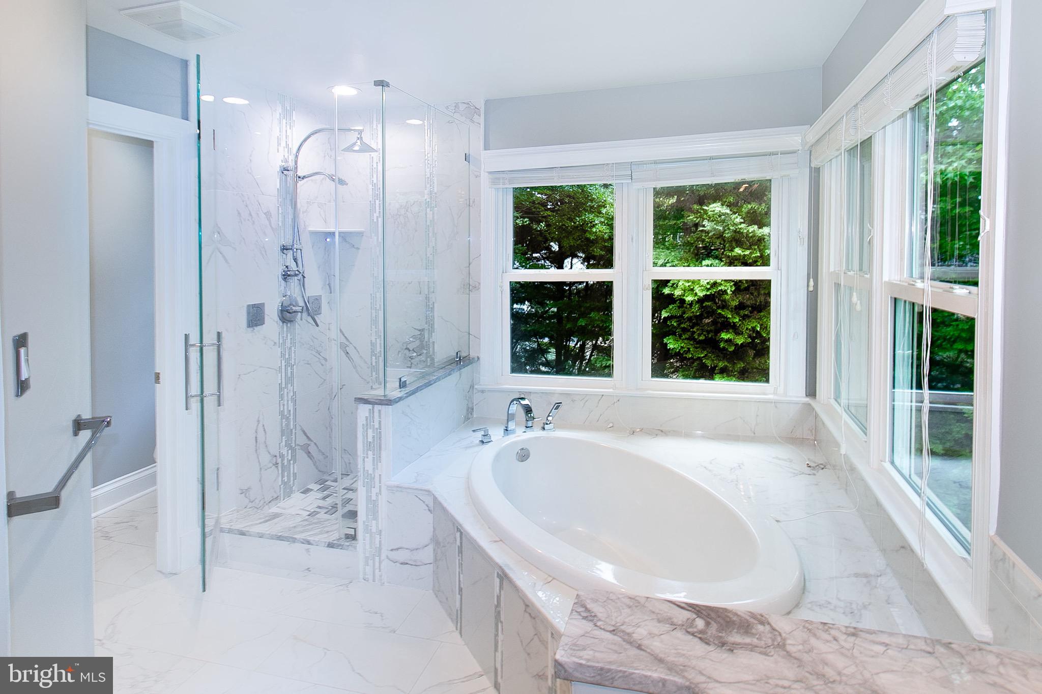 13500 Over Ridge Court Chantilly, VA 20151 - Photo 22 of 41 a spacious bathroom with a bathtub and shower