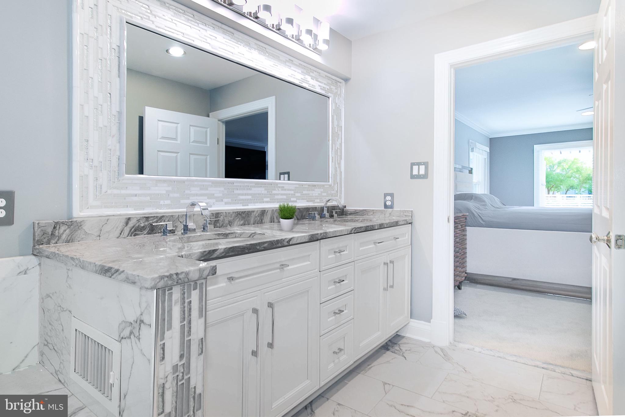 13500 Over Ridge Court Chantilly, VA 20151 - Photo 24 of 41 a bathroom with a granite countertop double vanity sink and mirror
