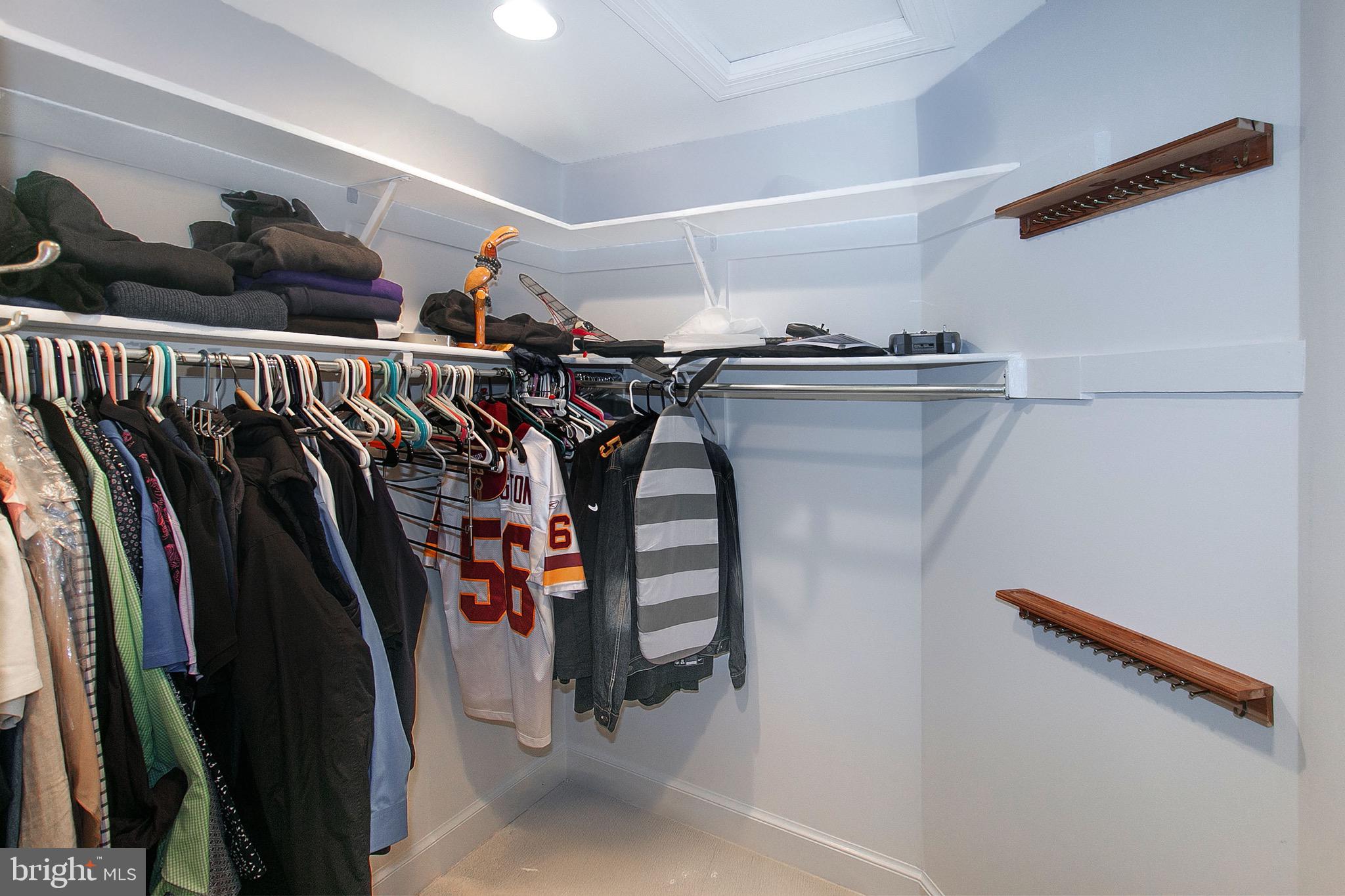 13500 Over Ridge Court Chantilly, VA 20151 - Photo 25 of 41 a view of walk in closet with clothes and shoes