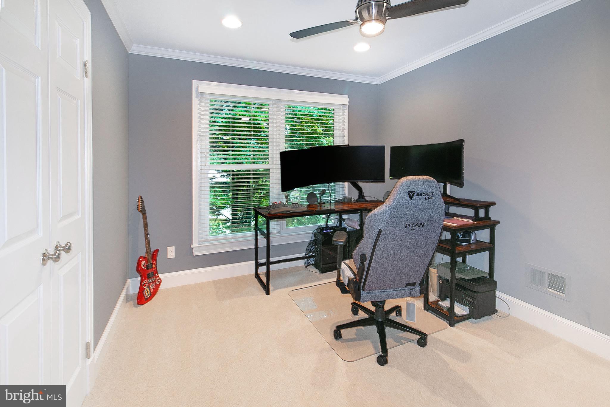 13500 Over Ridge Court Chantilly, VA 20151 - Photo 26 of 41 a view of a workspace with furniture and a window