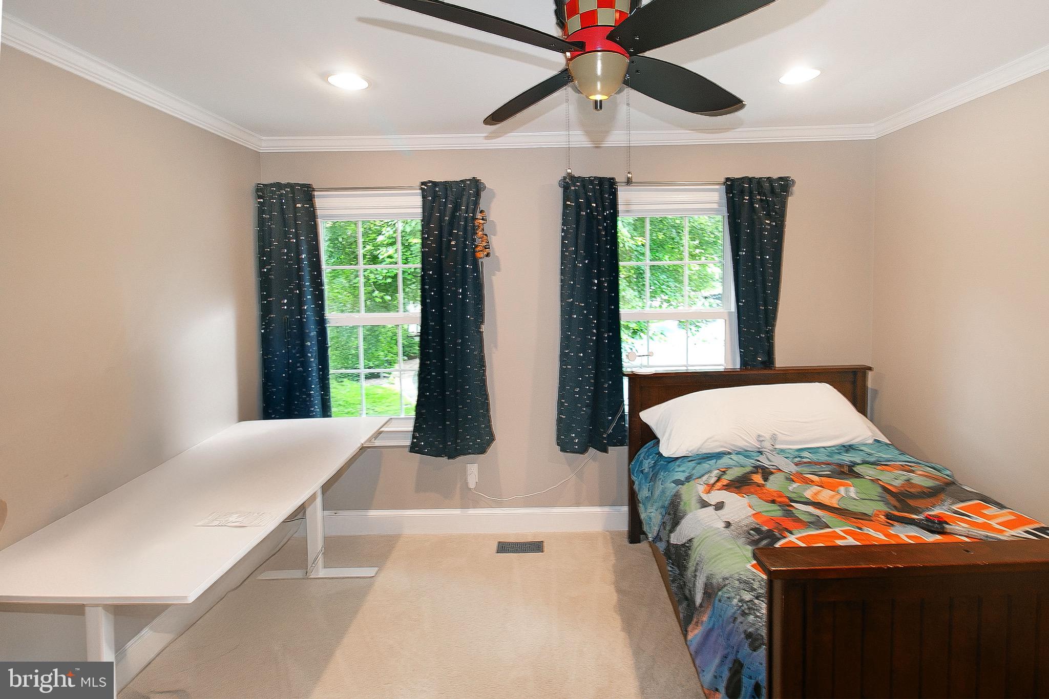 13500 Over Ridge Court Chantilly, VA 20151 - Photo 27 of 41 a bed sitting in a room next to a window