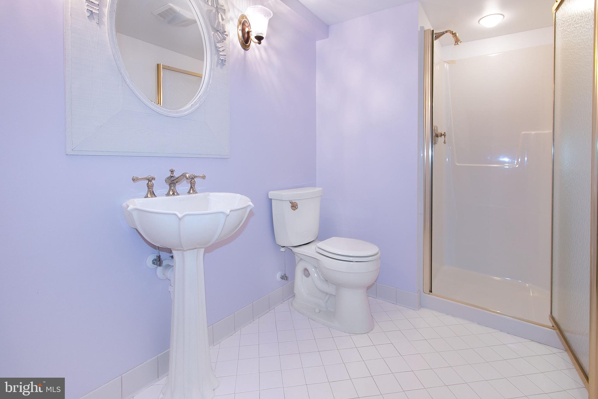 13500 Over Ridge Court Chantilly, VA 20151 - Photo 34 of 41 a bathroom with a sink toilet and a mirror