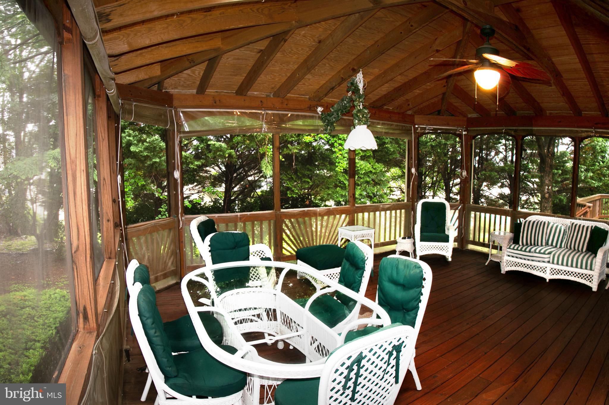 13500 Over Ridge Court Chantilly, VA 20151 - Photo 36 of 41 a balcony view with a large window and wooden floor