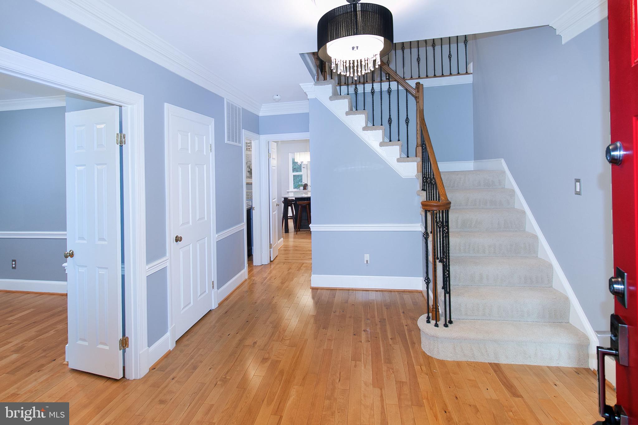 13500 Over Ridge Court Chantilly, VA 20151 - Photo 4 of 41 a view of entryway and hall with wooden floor