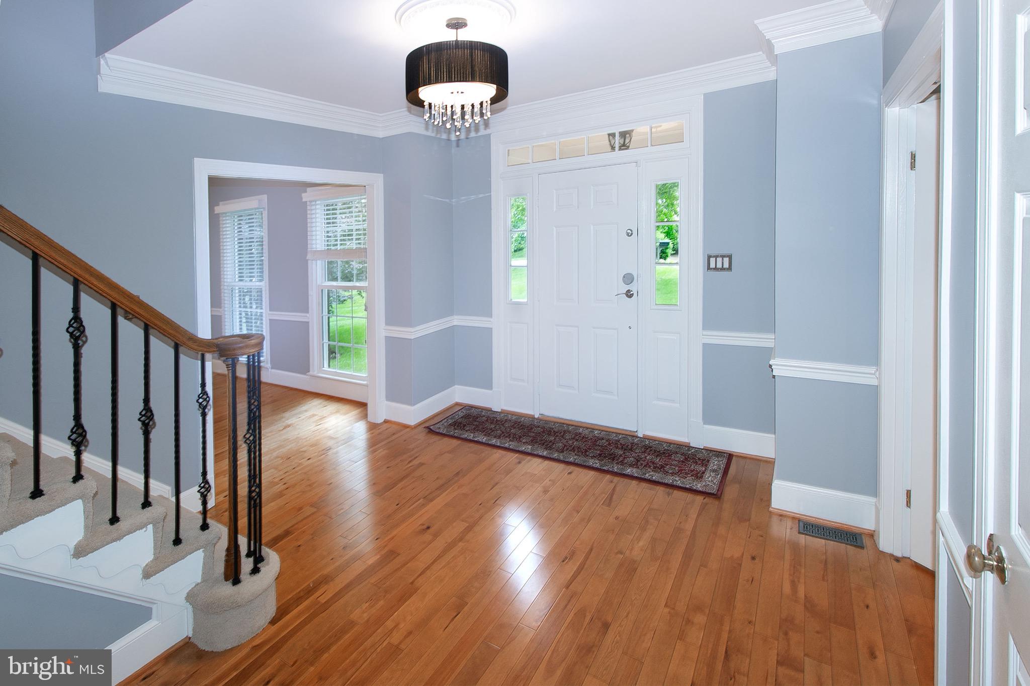 13500 Over Ridge Court Chantilly, VA 20151 - Photo 5 of 41 wooden floor in an empty room with a window