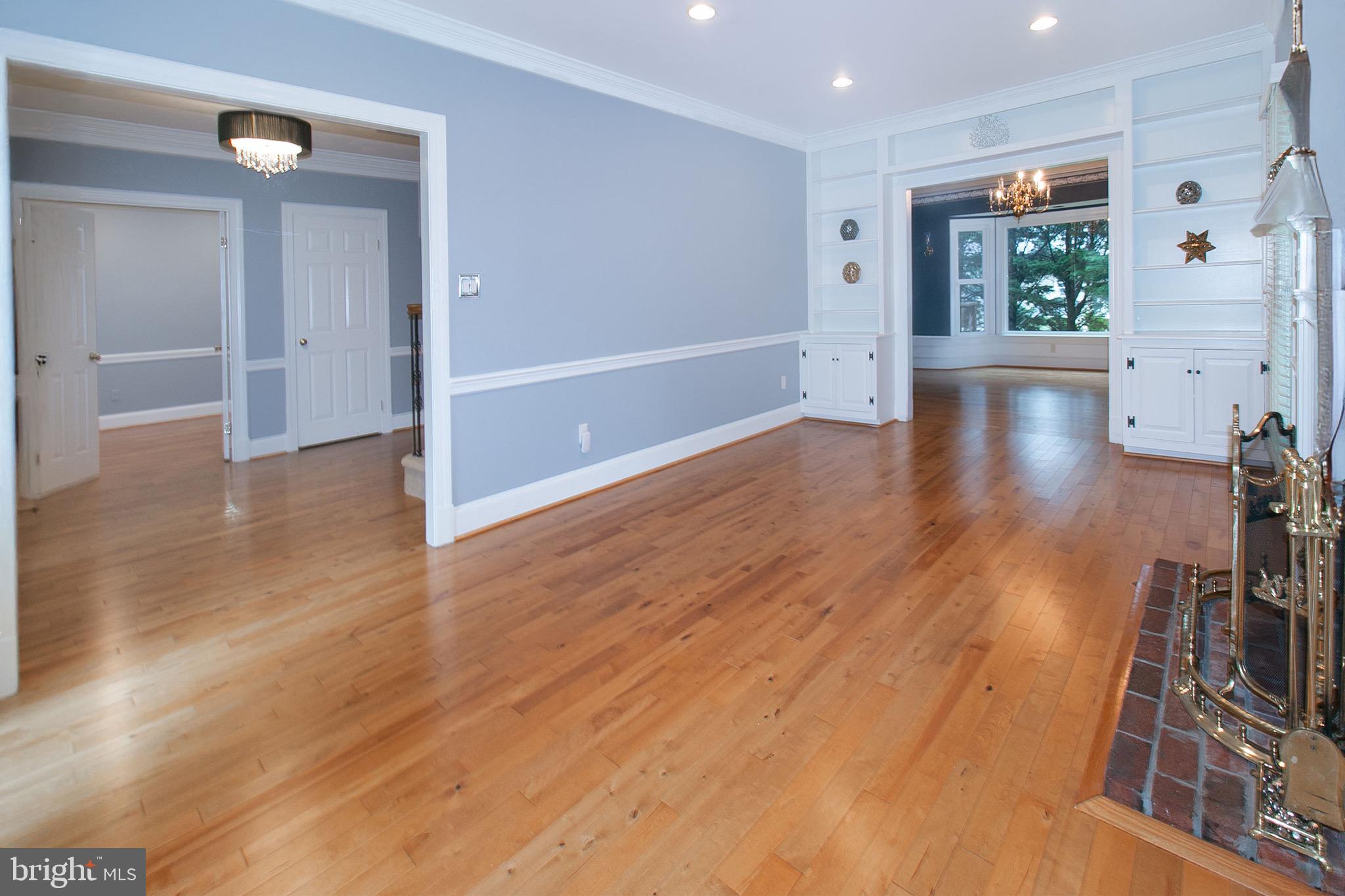 13500 Over Ridge Court Chantilly, VA 20151 - Photo 6 of 41 a view of a hallway with wooden floor
