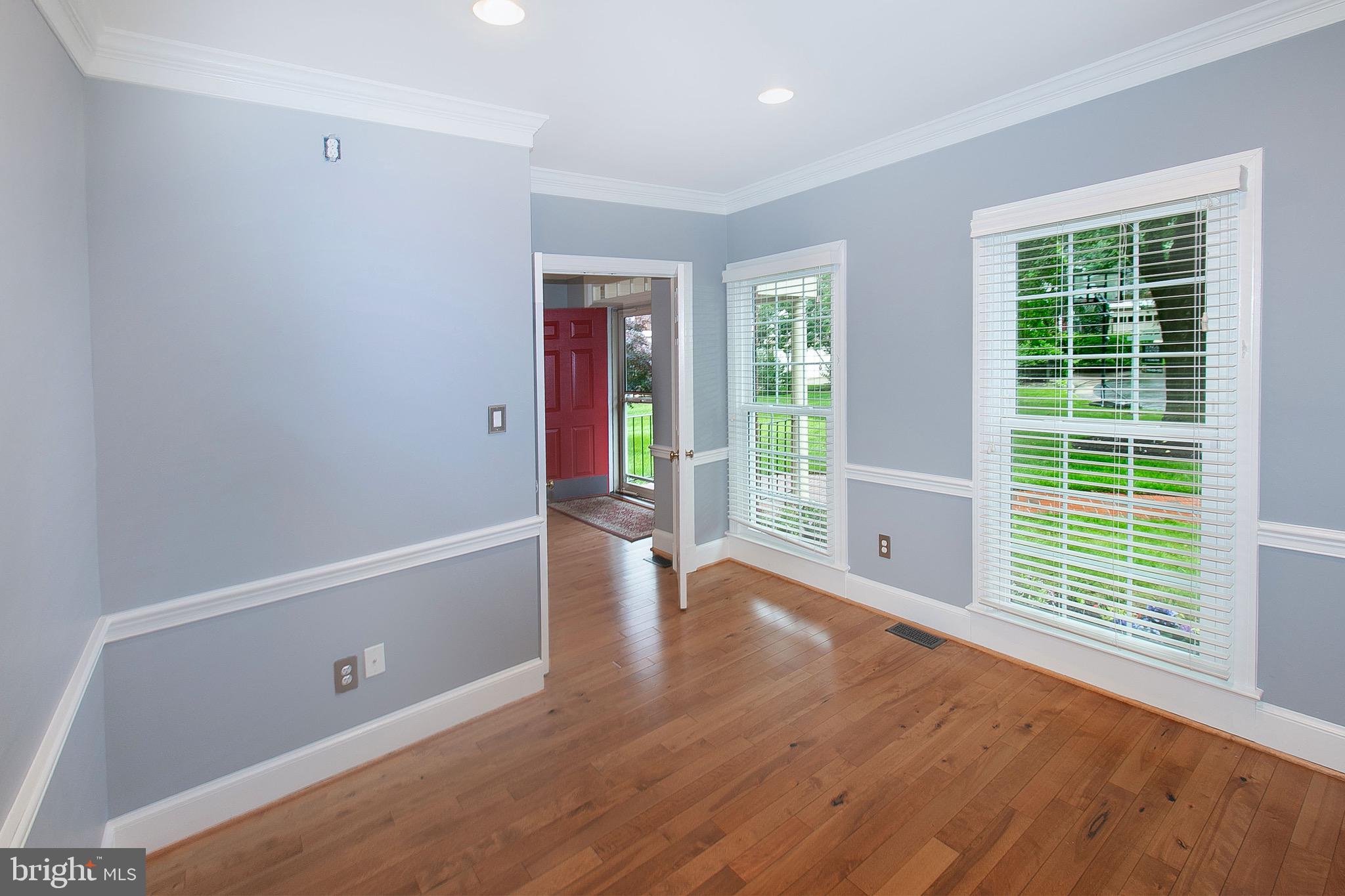 13500 Over Ridge Court Chantilly, VA 20151 - Photo 9 of 41 a view of an empty room with a window and wooden floor