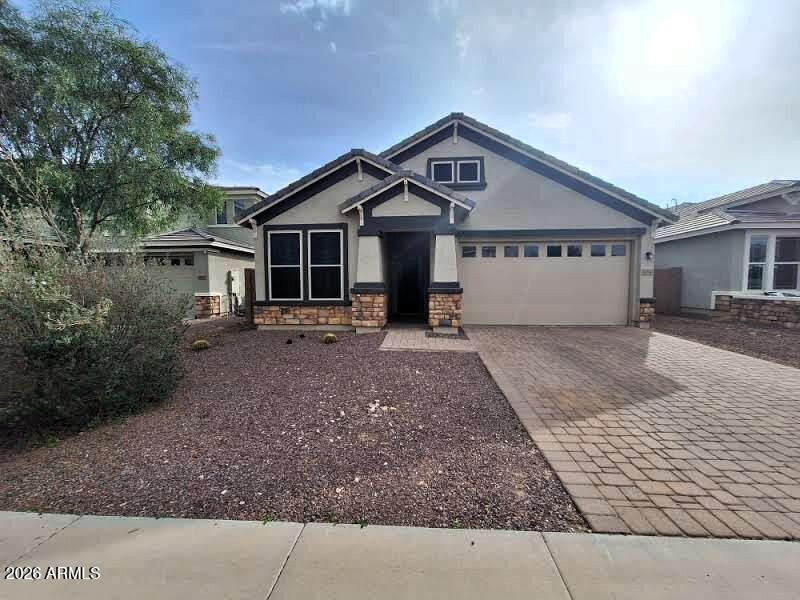 18541 West Mescal Street Surprise, AZ 85388 - Photo 1 of 31 a view of a house with a yard