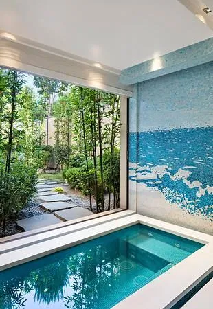 a view of swimming pool from a balcony